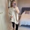 Cream poncho