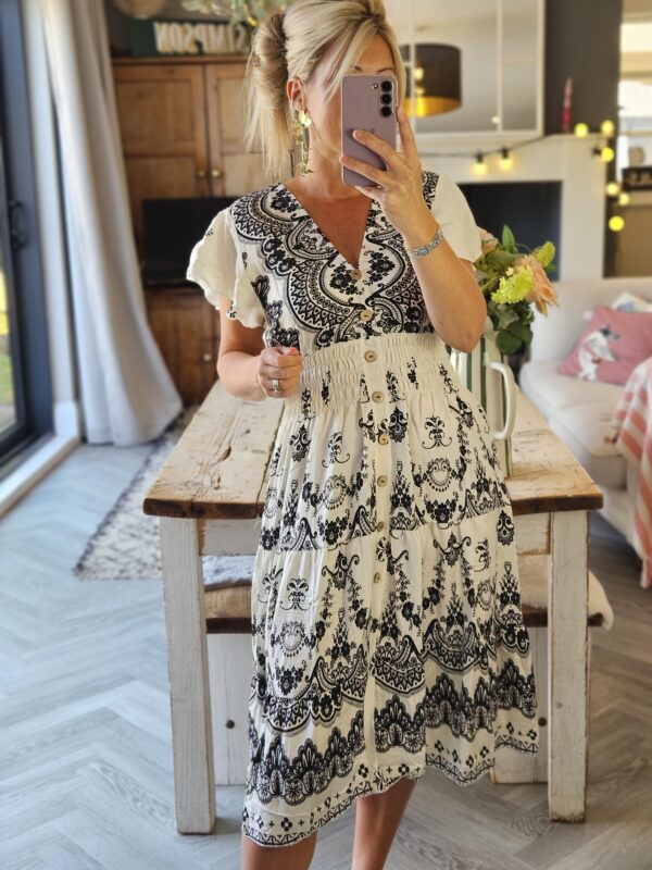 white and black midi dress