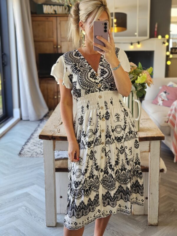 white and black midi dress